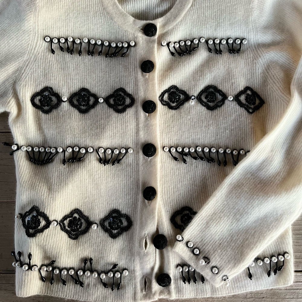 Marisa Christina sweater. White with black and white bead detail.